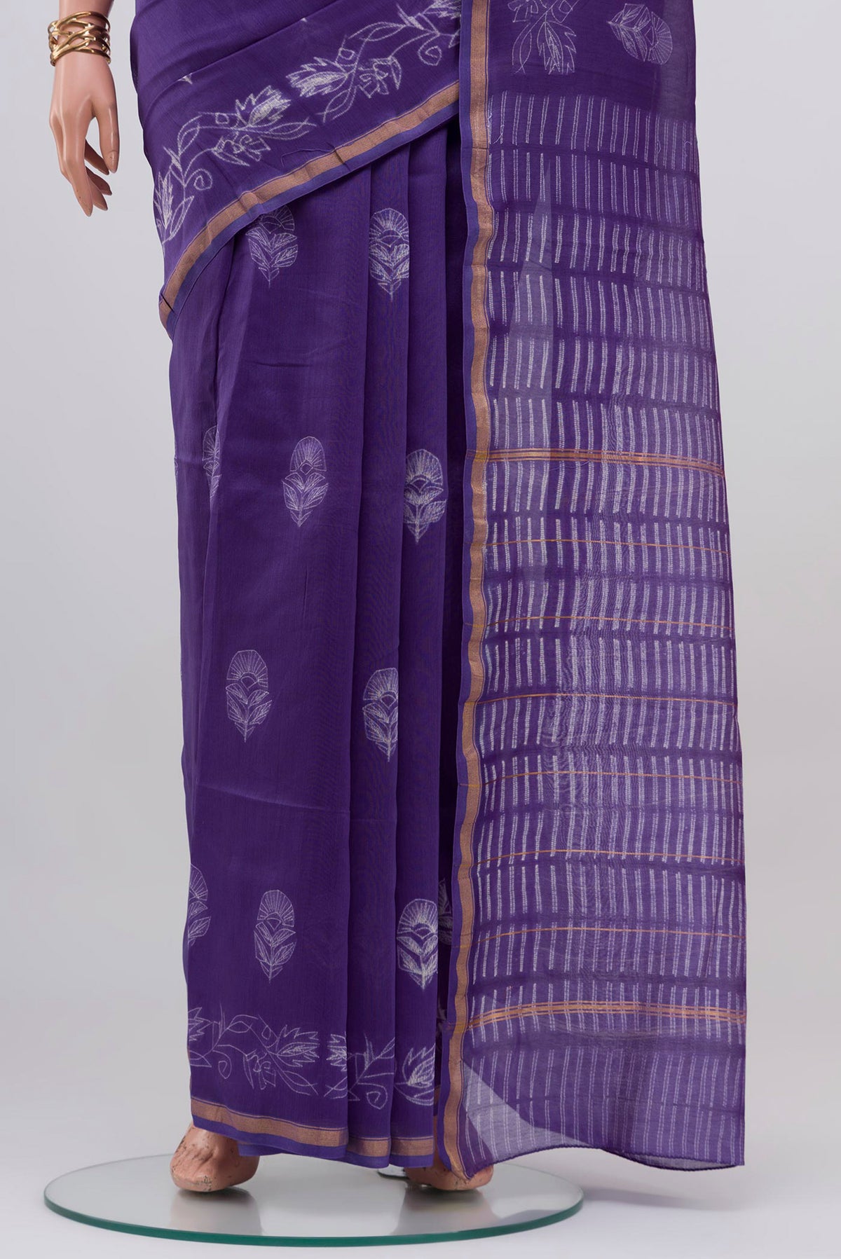 Pleats and pallu of Violet Chanderi Silk Cotton Saree with Printed design on the body and Thin Zari Line. 