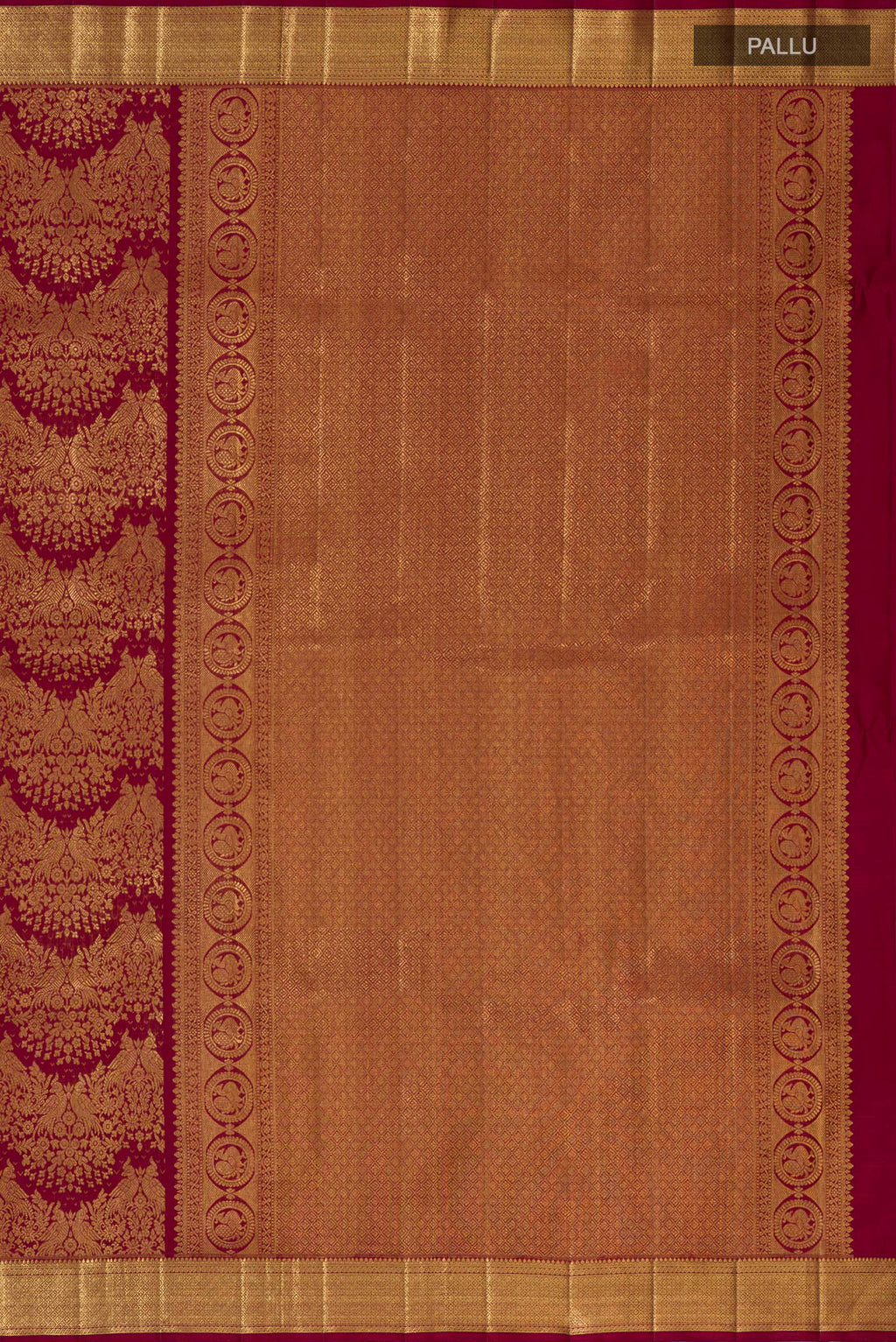 Close up image of the pallu of Pure Silk Maroon Kanchipuram Saree with Zari Brocade on the body and Zari Border. 