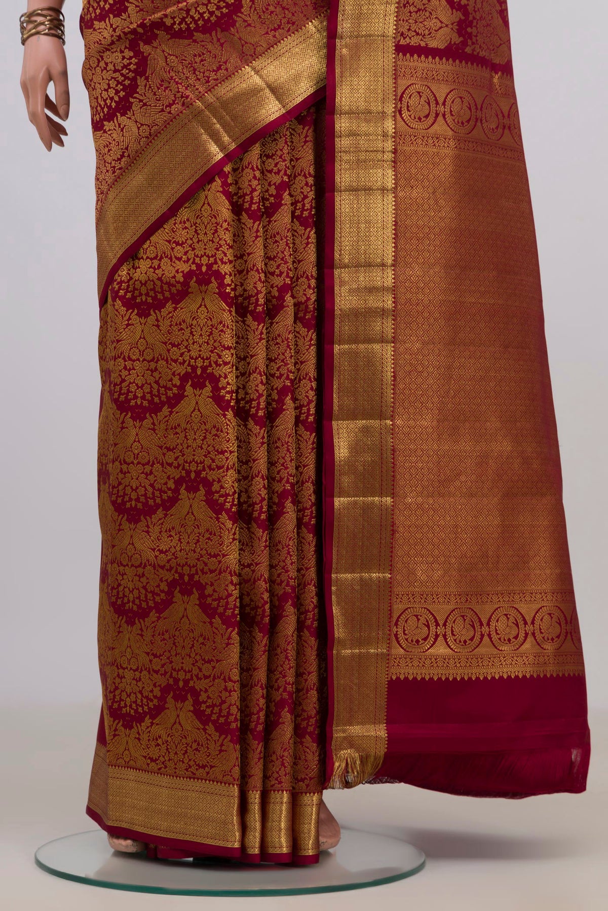 Pleats and pallu of Pure Silk Maroon Kanchipuram Saree with Zari Brocade on the body and Zari Border. 