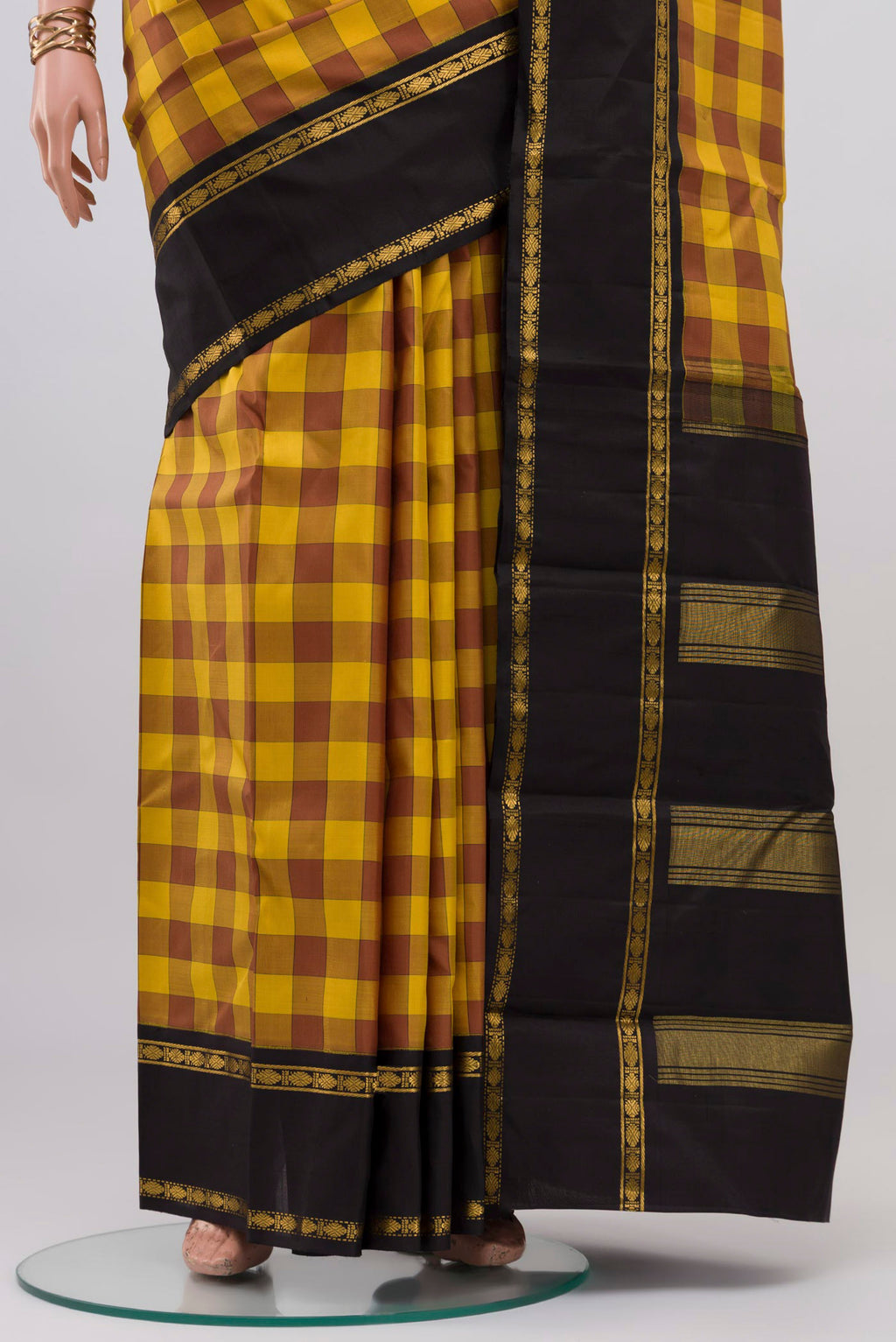 Pleats and pallu of Multi Color Kanjivaram Silk Saree with Checked design on the body and Zari Border. 