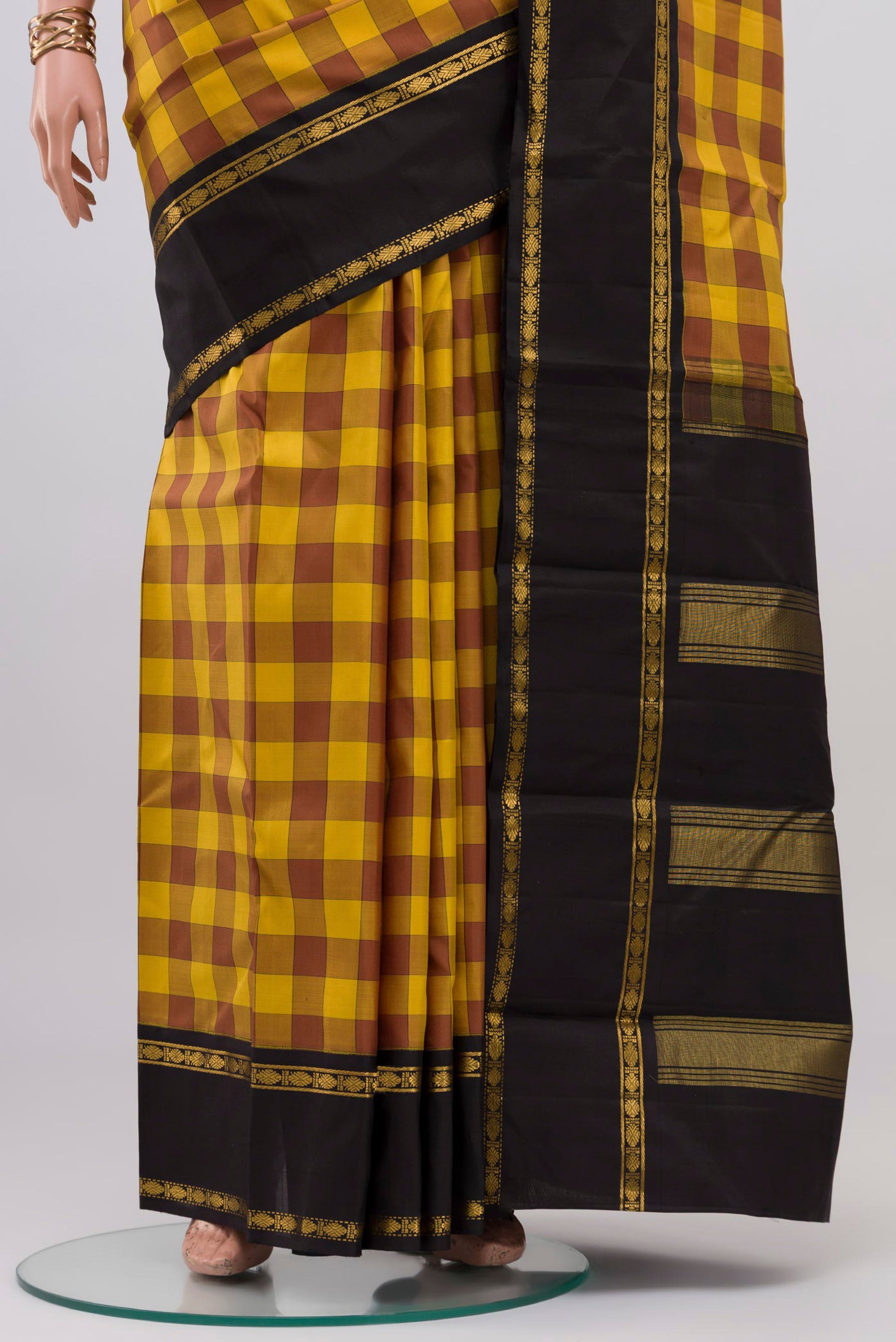 Pleats and pallu of Multi Color Kanjivaram Silk Saree with Checked design on the body and Zari Border. 
