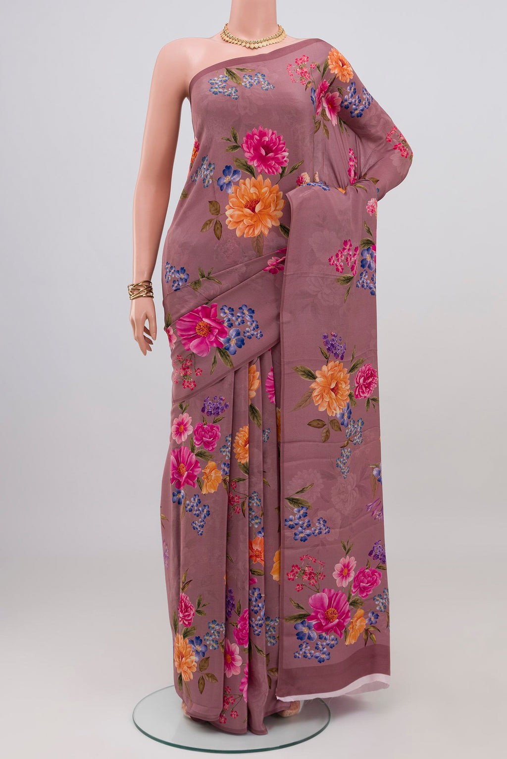 Mauve Crepe Saree with Floral Print on the body and Without Border.  displayed on a mannequin