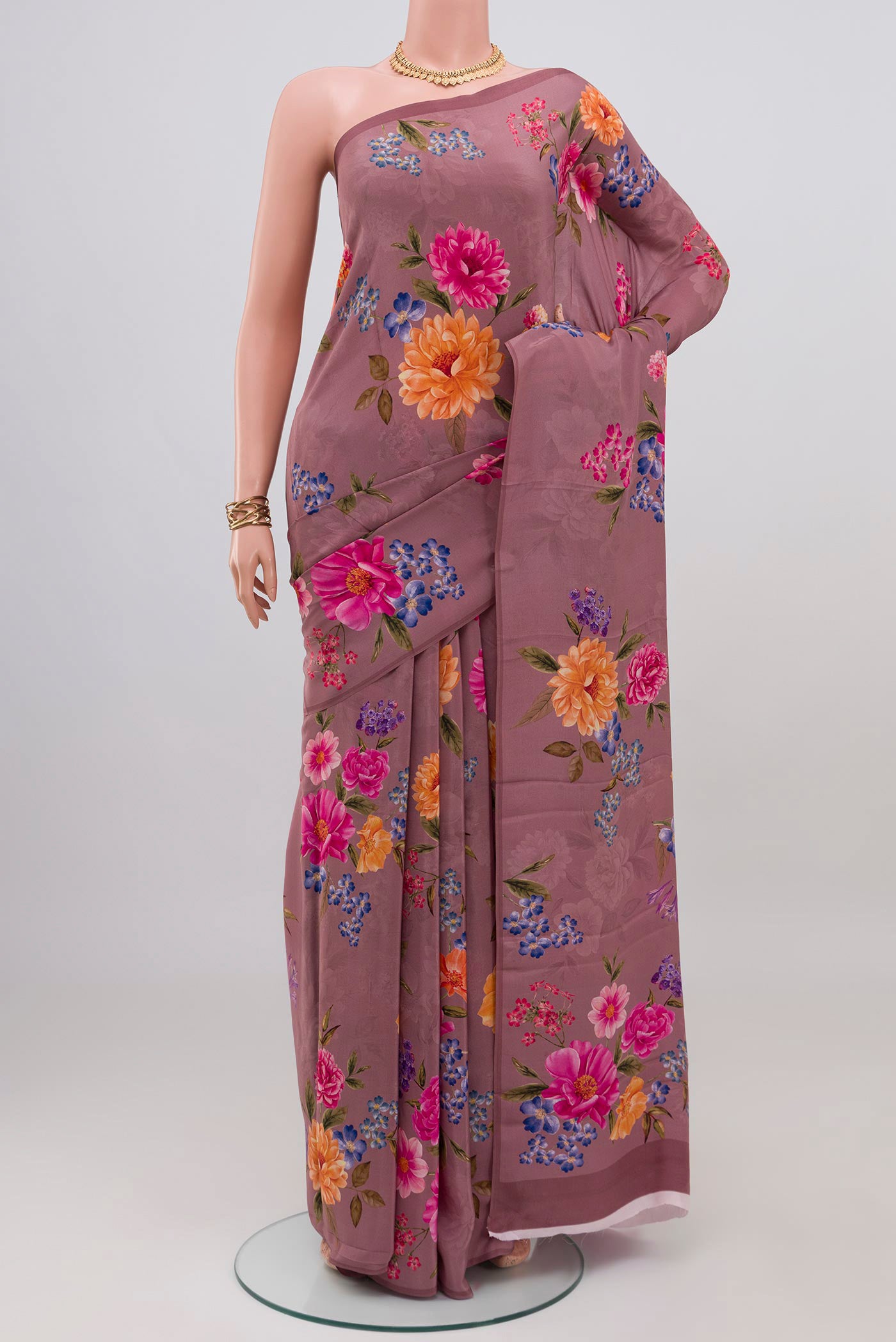 Mauve Crepe Saree with Floral Print on the body and Without Border.  displayed on a mannequin