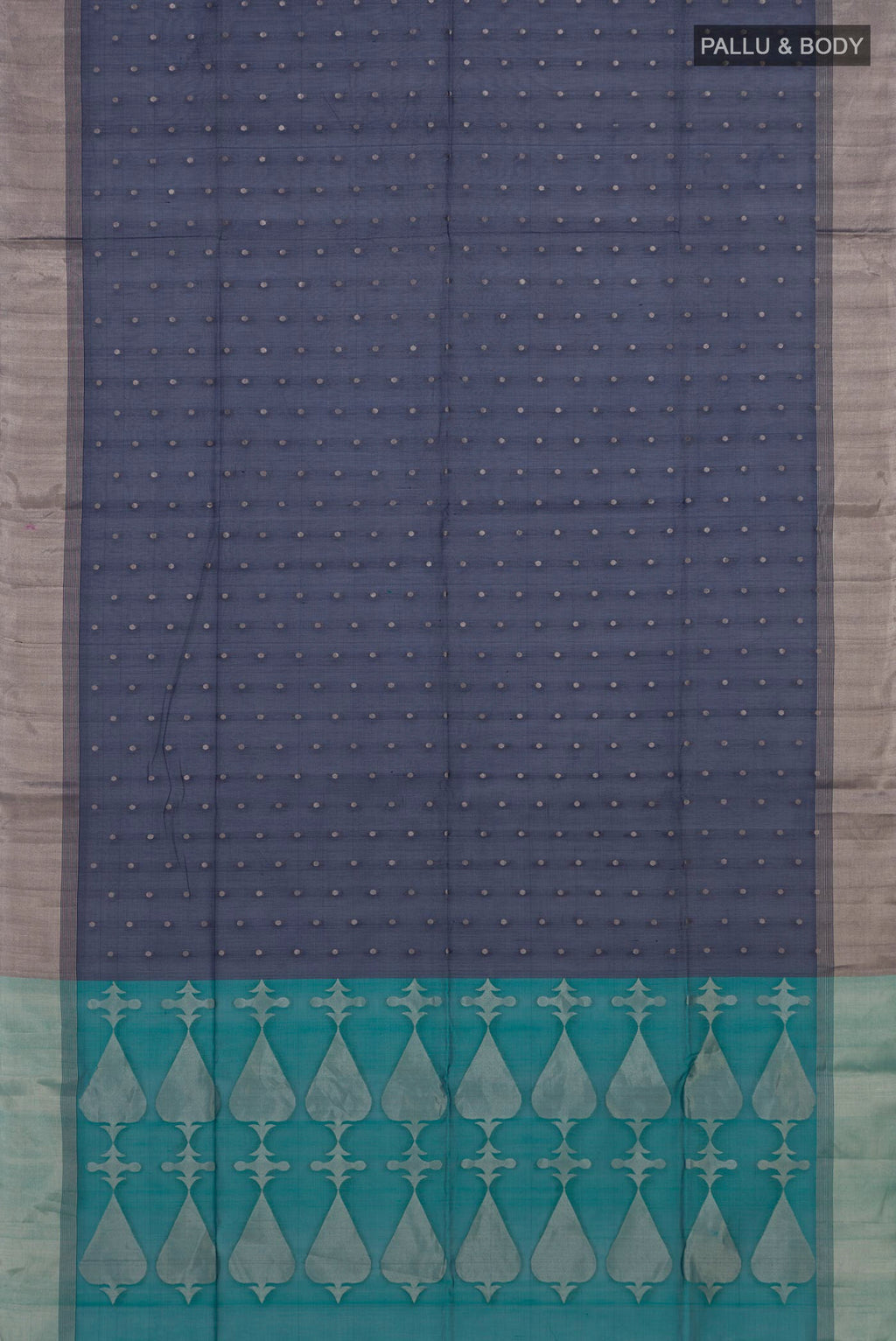 Flat view of Navy Blue Silk Cotton Saree with Zari Butta on the body and Zari Border. 