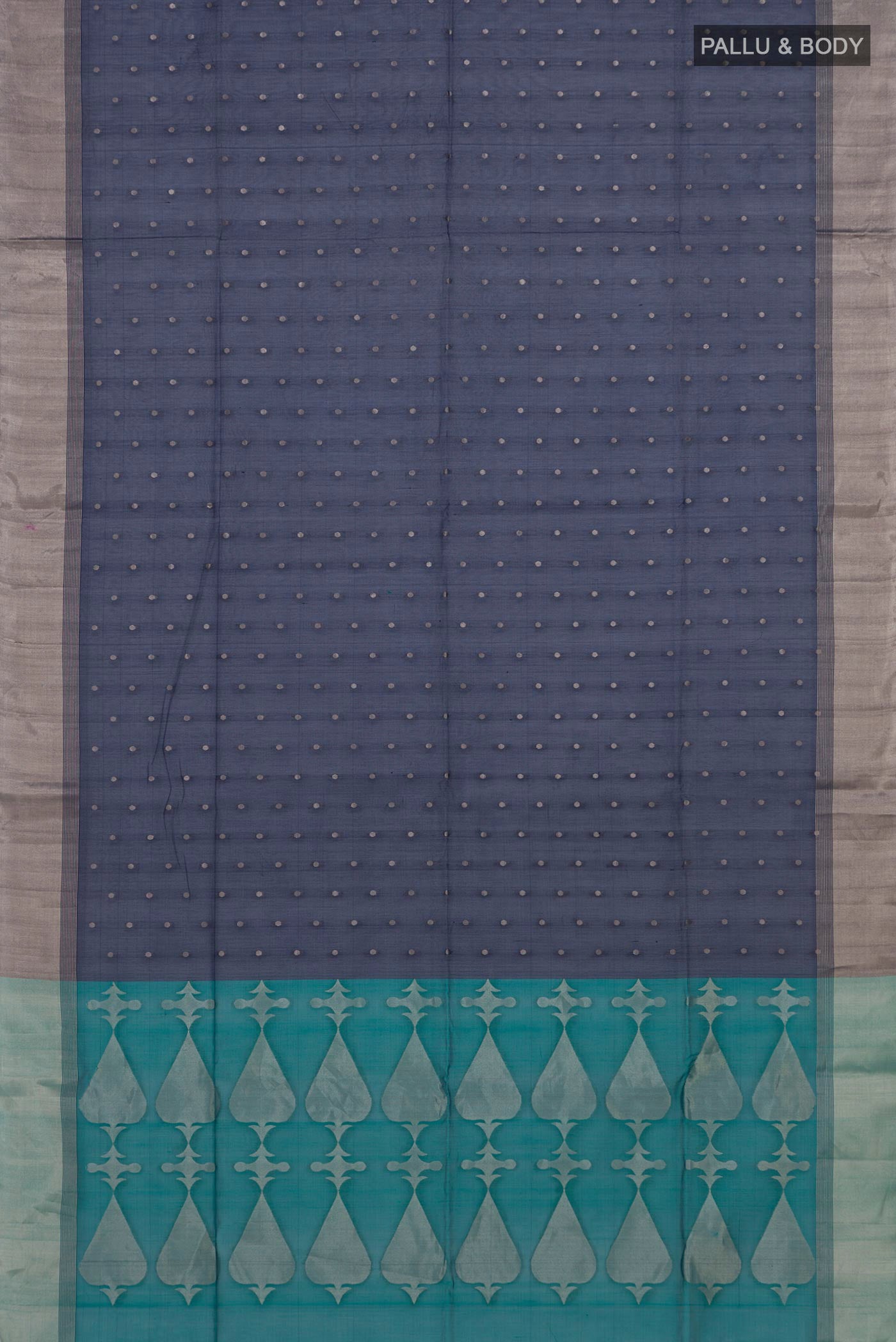 Flat view of Navy Blue Silk Cotton Saree with Zari Butta on the body and Zari Border. 