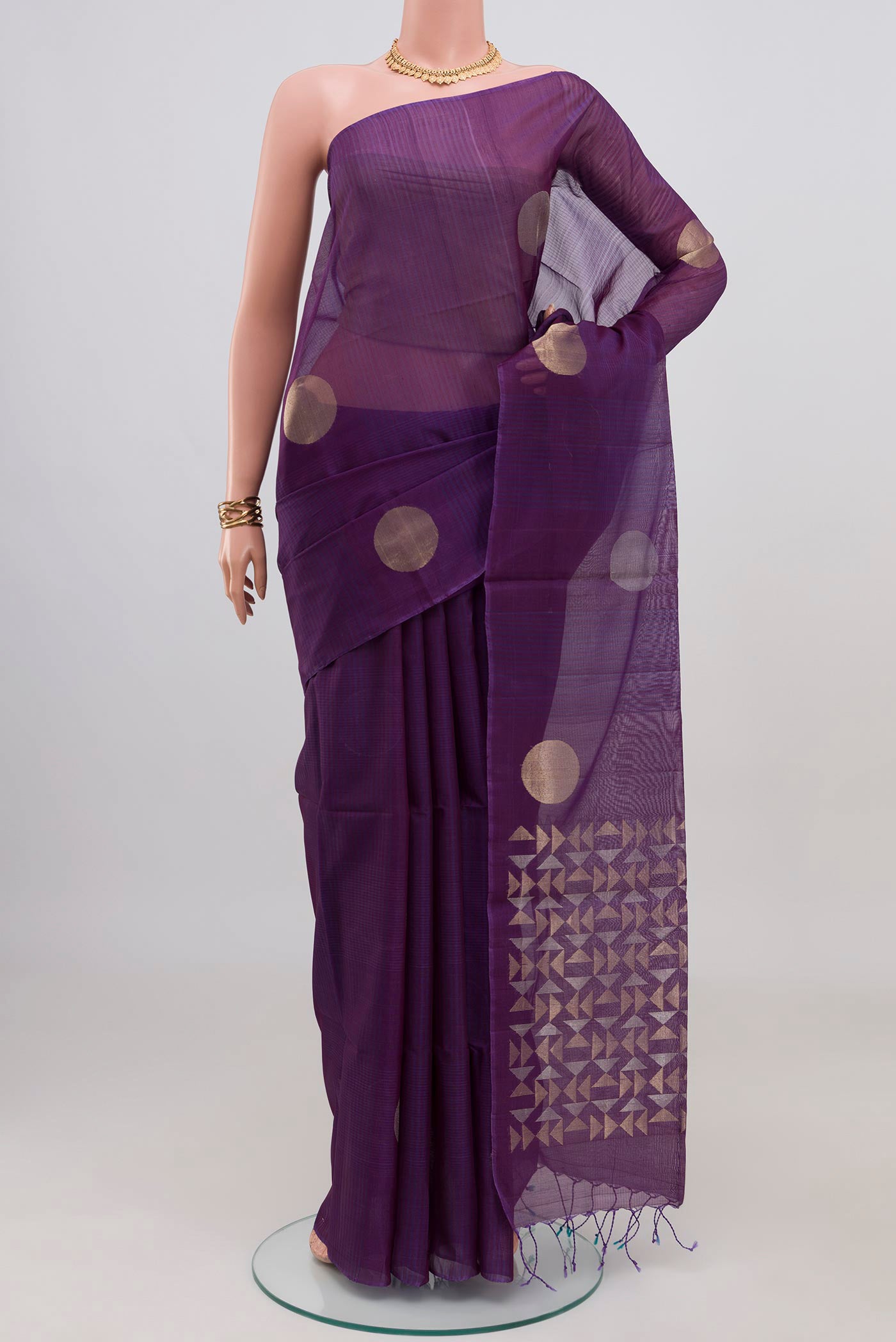 Purple Silk Cotton Saree with Polka Dots on the body and Without Border.  displayed on a mannequin
