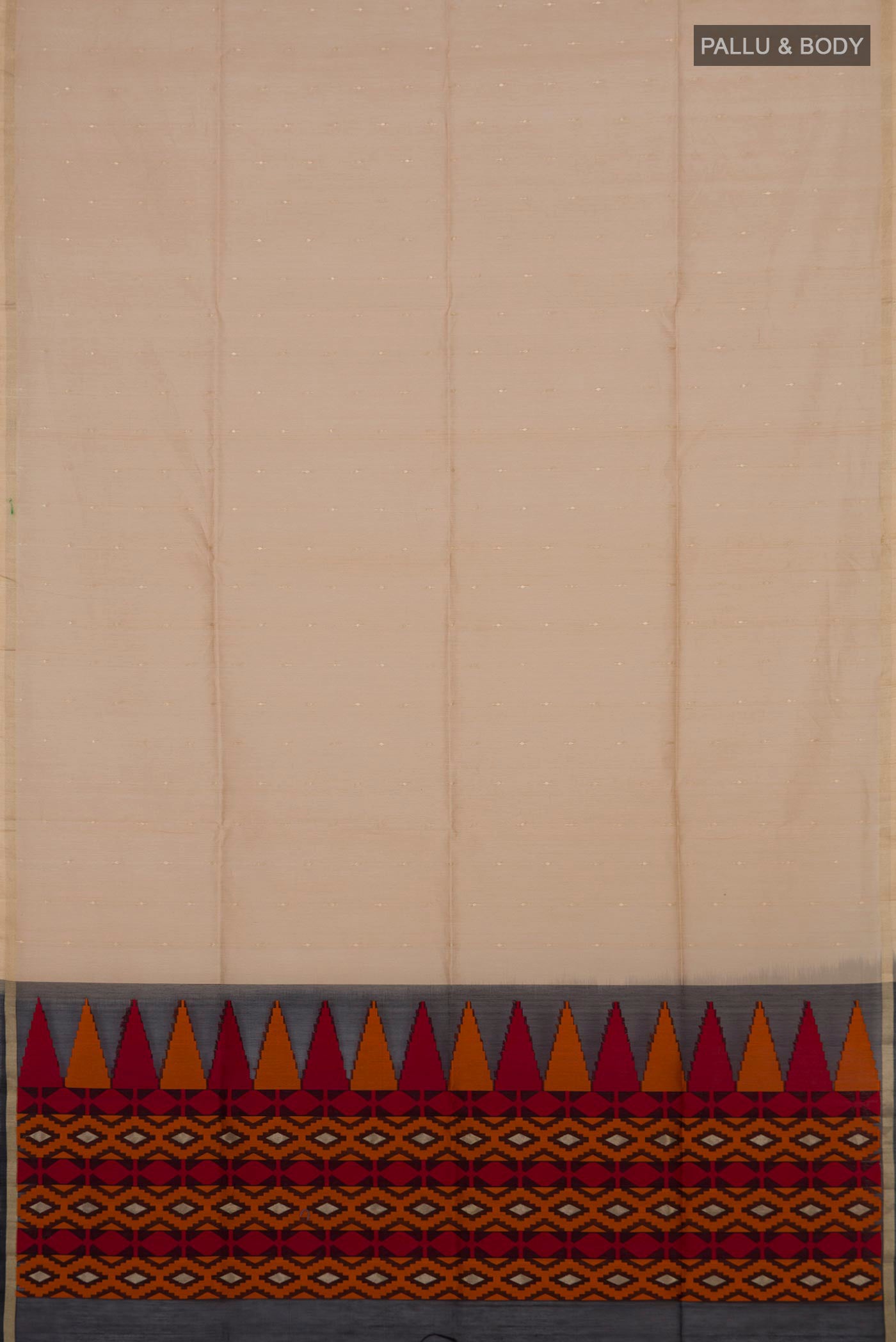 Flat view of Beige Silk Cotton Saree with Zari Butta on the body and Zari Border. 