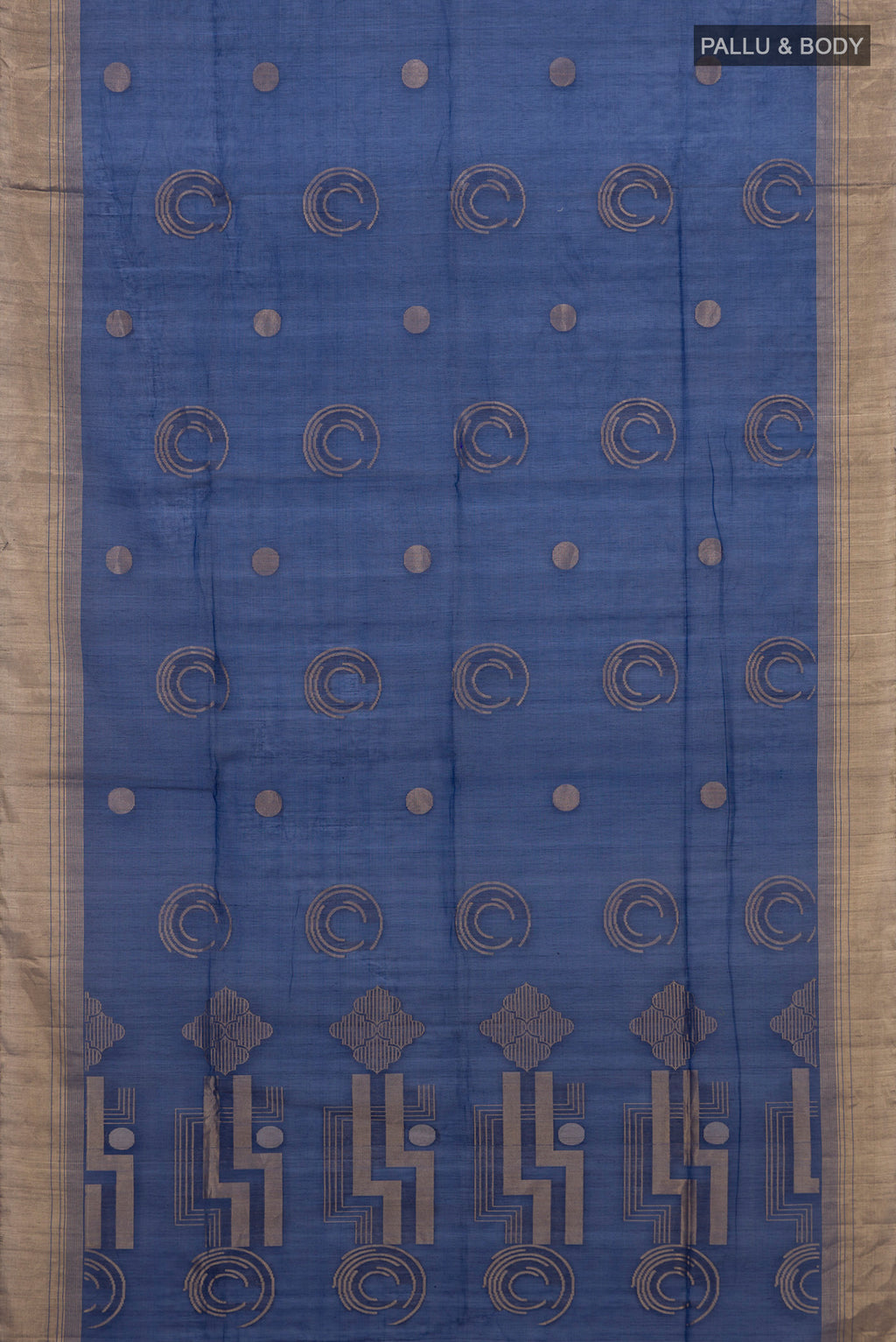 Flat view of Blue Silk Cotton Saree with Zari Butta on the body and Zari Border. 