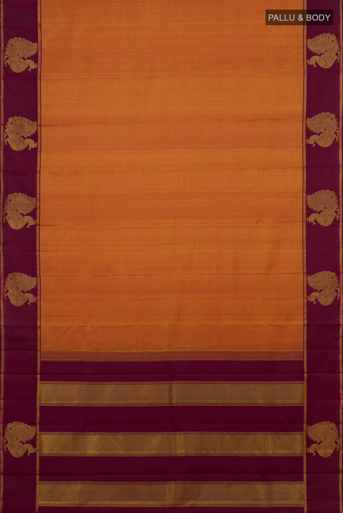 Flat view of Mustard Kanchipuram Silk Saree with Plain Body and Fancy Border. 
