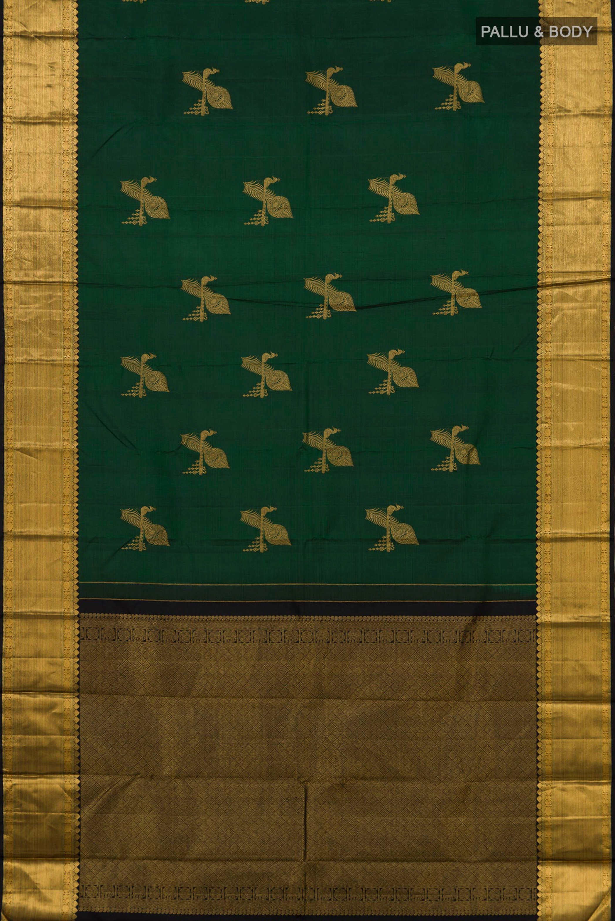Flat view of Bottle Green Kanjivaram Silk Saree with Zari Butta on the body and Zari Border. 