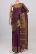Violet Kanchipuram Silk Saree with Zari Brocade on the body and Zari Border.  displayed on a mannequin