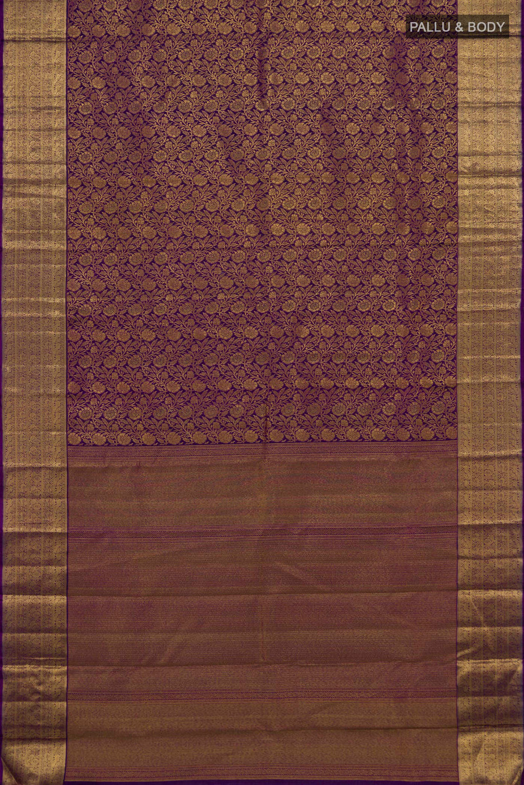 Flat view of Violet Kanchipuram Silk Saree with Zari Brocade on the body and Zari Border. 