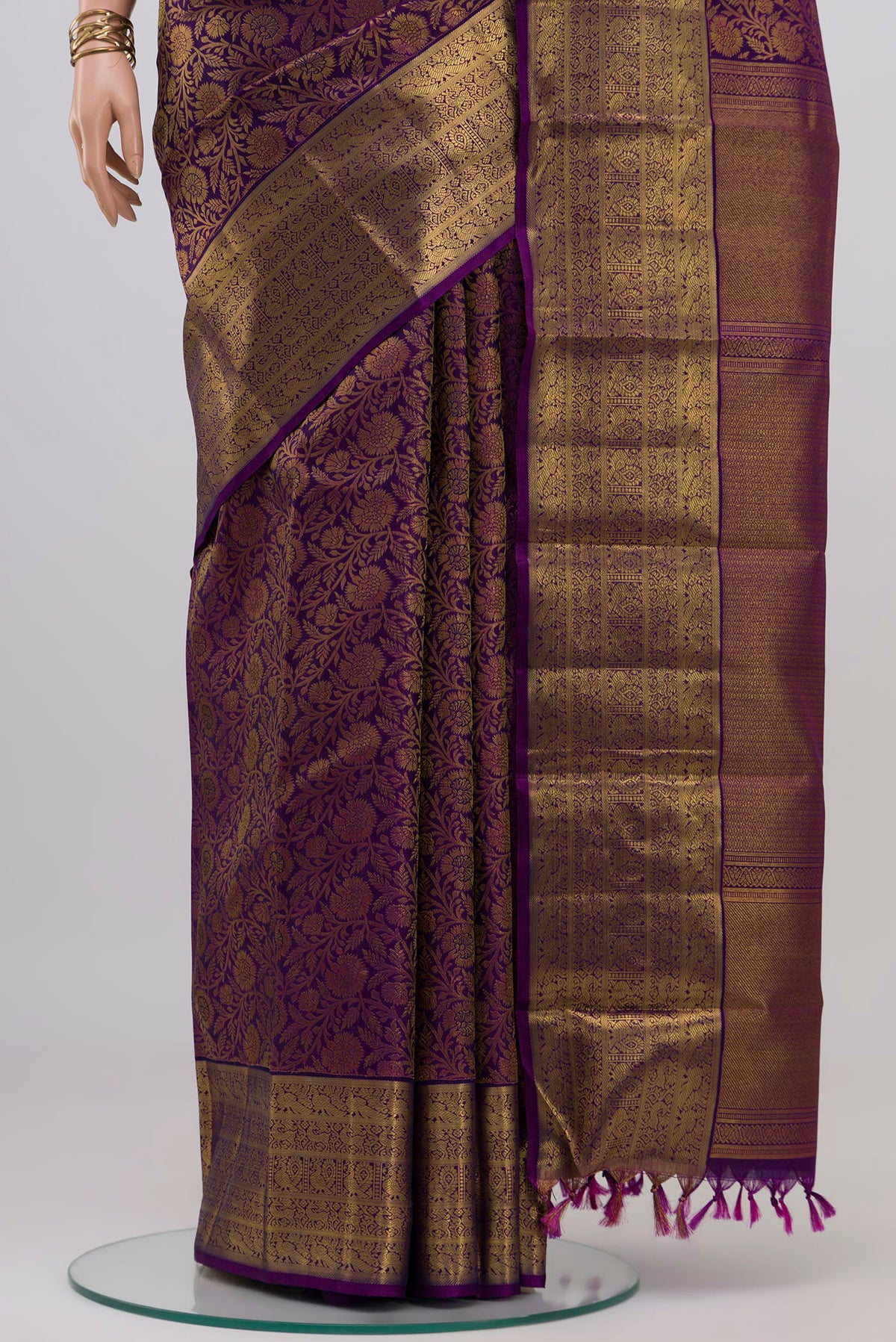 Pleats and pallu of Violet Kanchipuram Silk Saree with Zari Brocade on the body and Zari Border. 