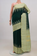 Pure Silk Bottle Green Kanjivaram Saree with Plain Body and Temple Border.  displayed on a mannequin