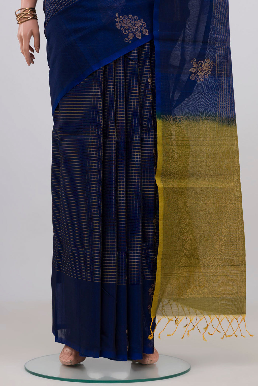 Pleats and pallu of Blue Silk Cotton Saree with Checked design on the body and Fancy Border. 