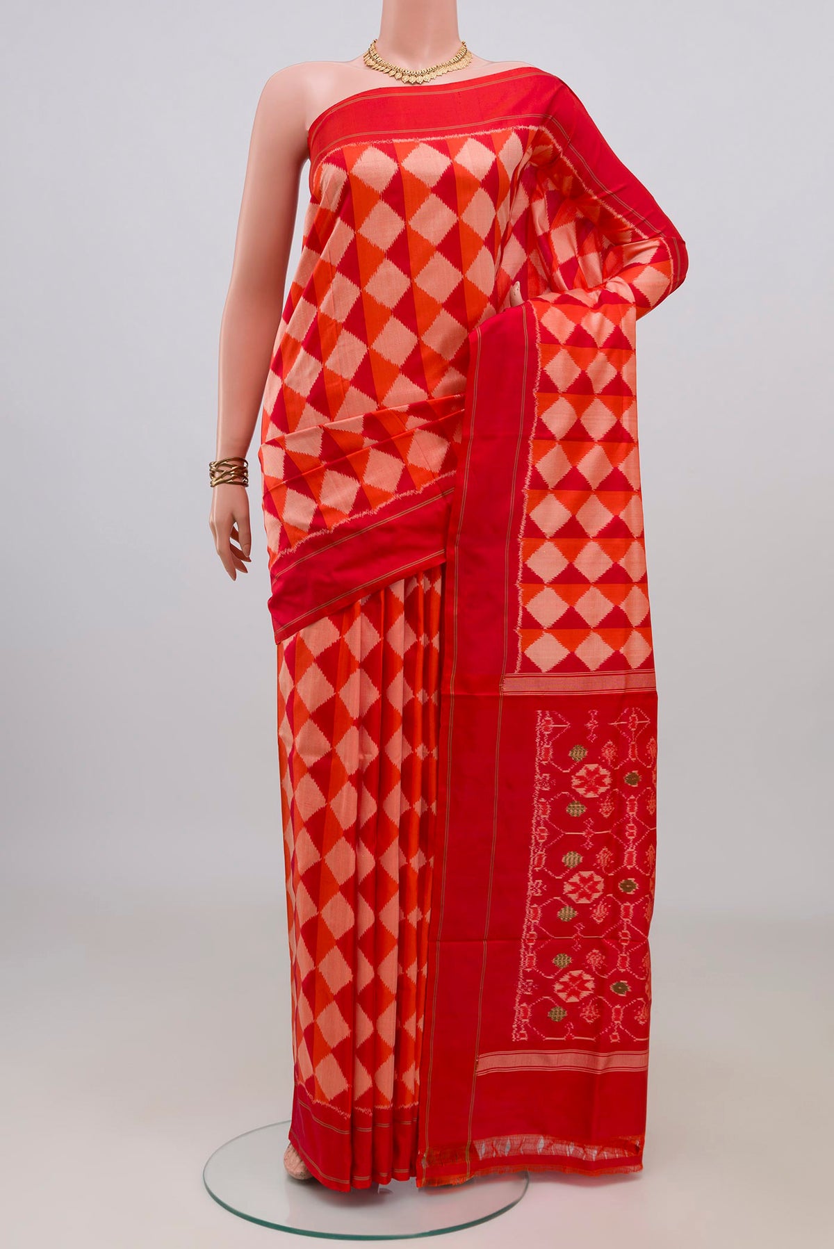 Pure Silk Multi Color Pochampally Saree with Ikat design on the body and Plain Border.  displayed on a mannequin