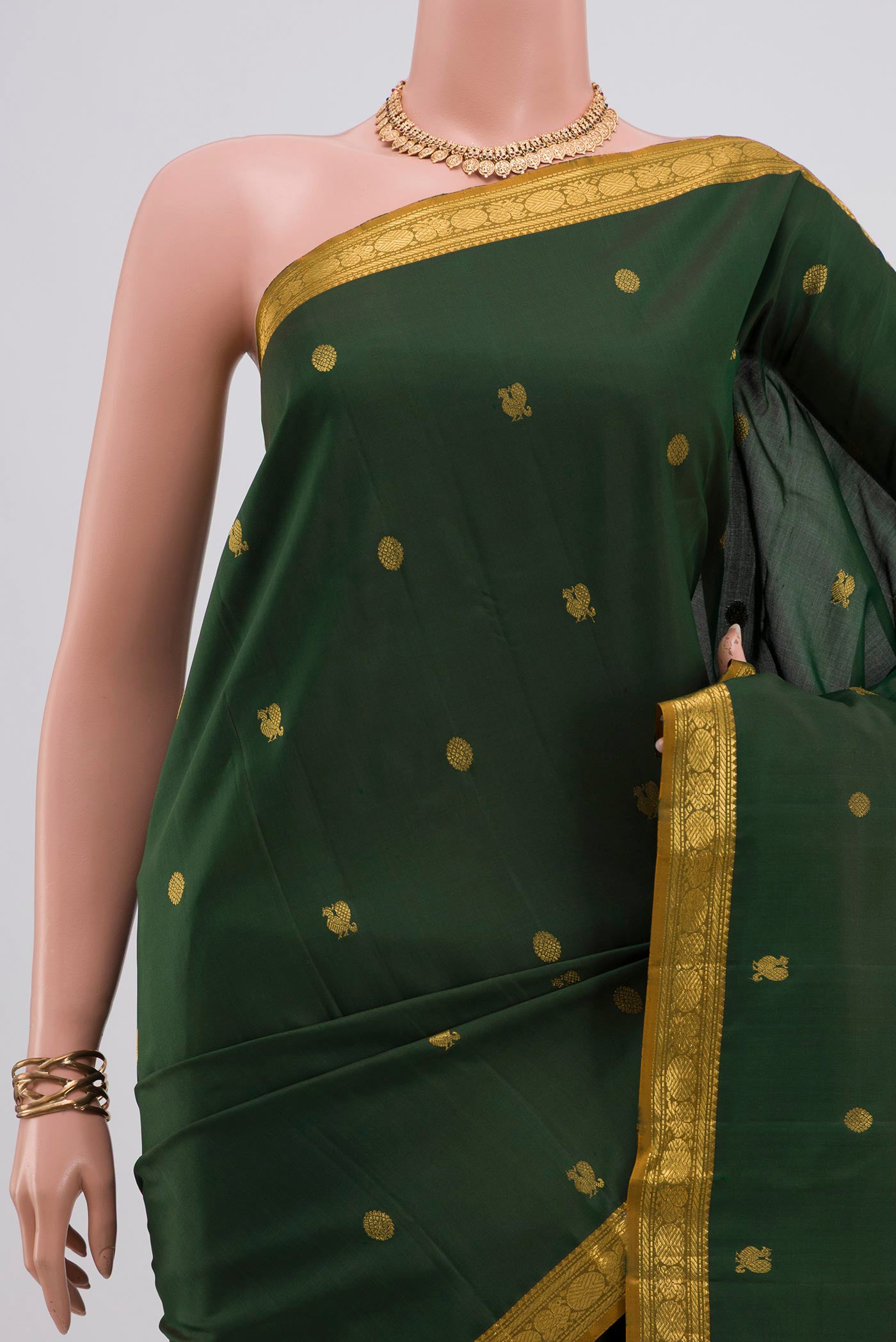 Border image of Pure Silk Pure Zari Green Kanchipuram Saree with Zari Butta on the body and Zari Border. 