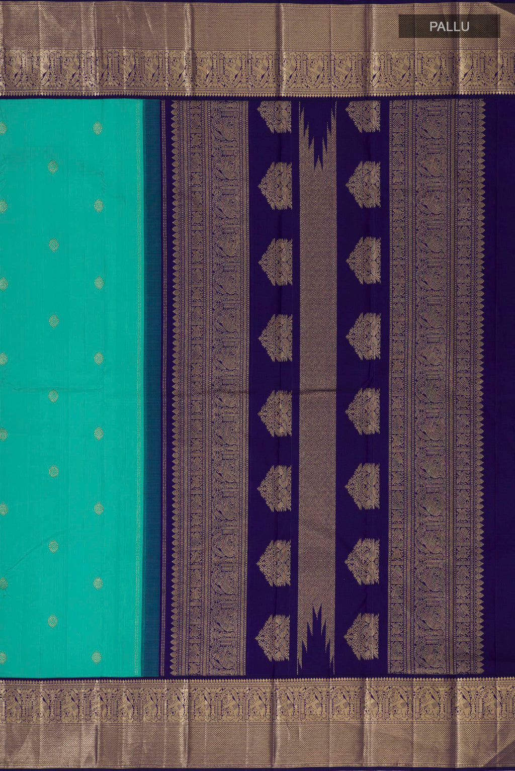 Close up image of the pallu of Turquoise Kanjivaram Silk Saree with Zari Butta on the body and Zari Border. 