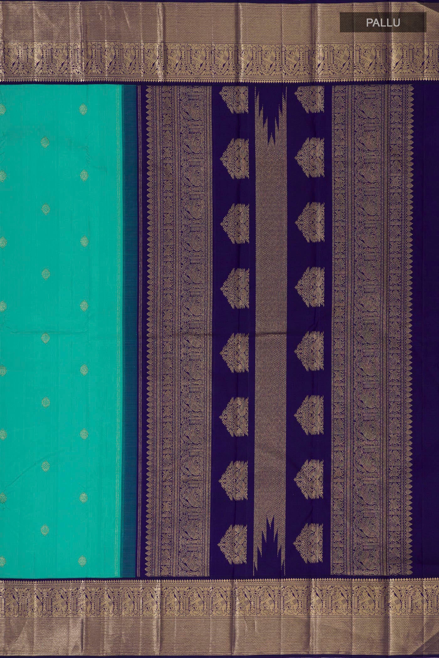 Close up image of the pallu of Turquoise Kanjivaram Silk Saree with Zari Butta on the body and Zari Border. 