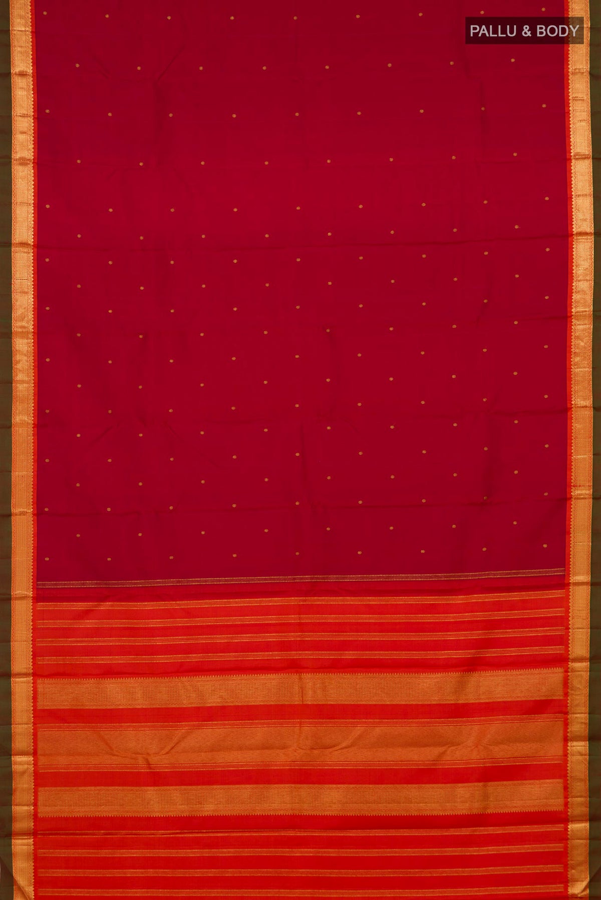 Flat view of Maroon Kanchipuram Silk Saree with Zari Butta on the body and Zari Border. 