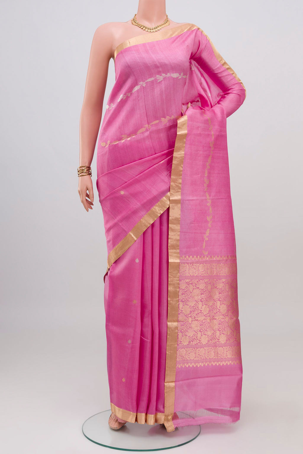 Pink Banarasi Katan Silk Saree with Zari Butta on the body and Zari Border.  displayed on a mannequin