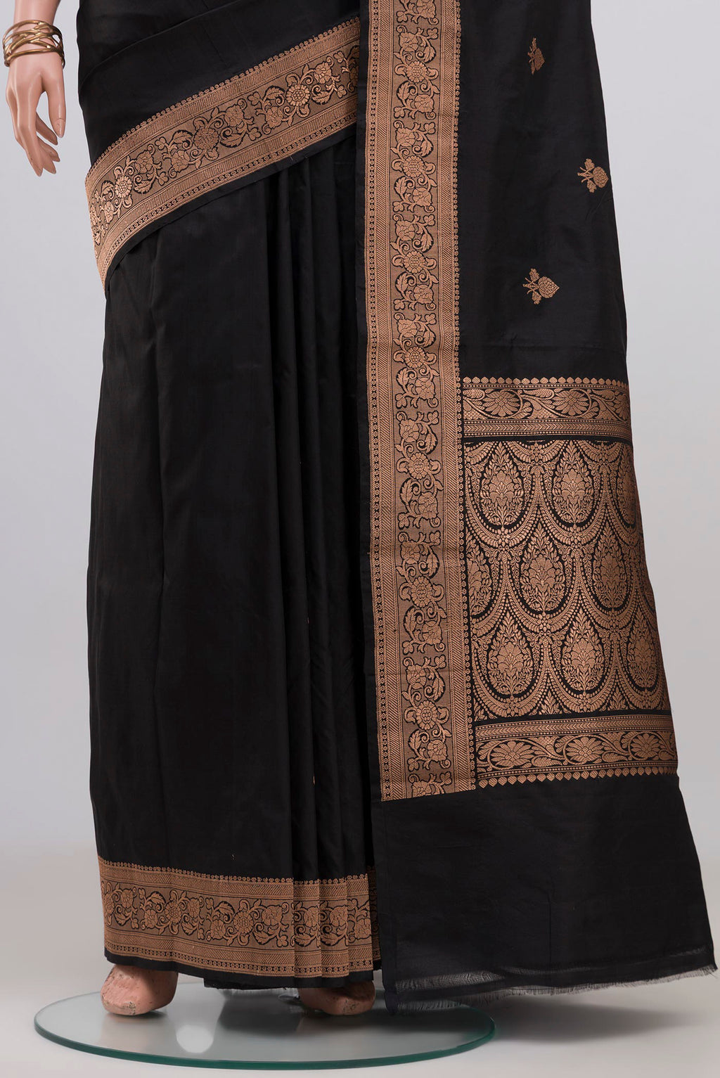 Pleats and pallu of Black Banarasi Katan Silk Saree with Zari Butta on the body and Zari Border. 