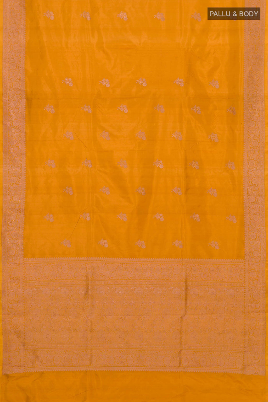 Flat view of Mustard Banarasi Katan Silk Saree with Zari Butta on the body and Zari Border. 