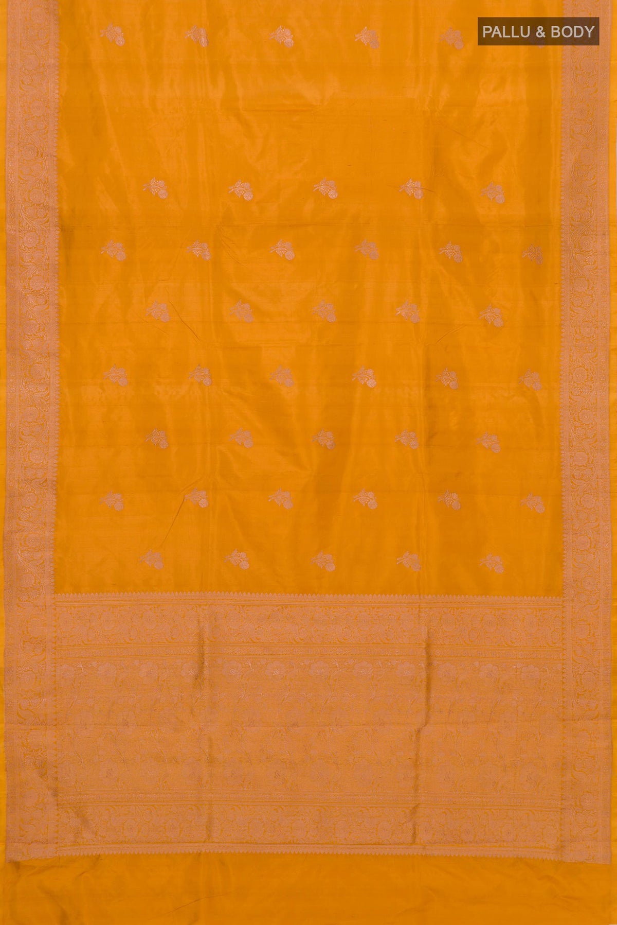 Flat view of Mustard Banarasi Katan Silk Saree with Zari Butta on the body and Zari Border. 