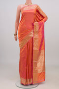 Peach Dual Tone Banarasi Katan Silk Saree with Zari Butta on the body and Zari Border.  displayed on a mannequin