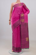 Pure Silk Pink Kanchipuram Saree with Zari Butta on the body and Fancy Border.  displayed on a mannequin