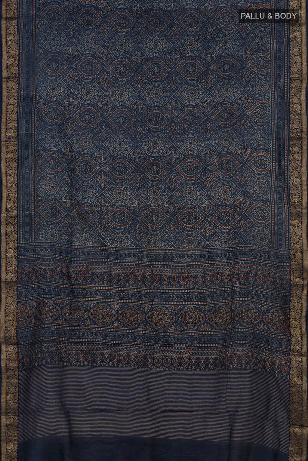 Flat view of Navy Blue Chanderi Silk Cotton Saree with Ajrakh Print on the body and Zari Border. 