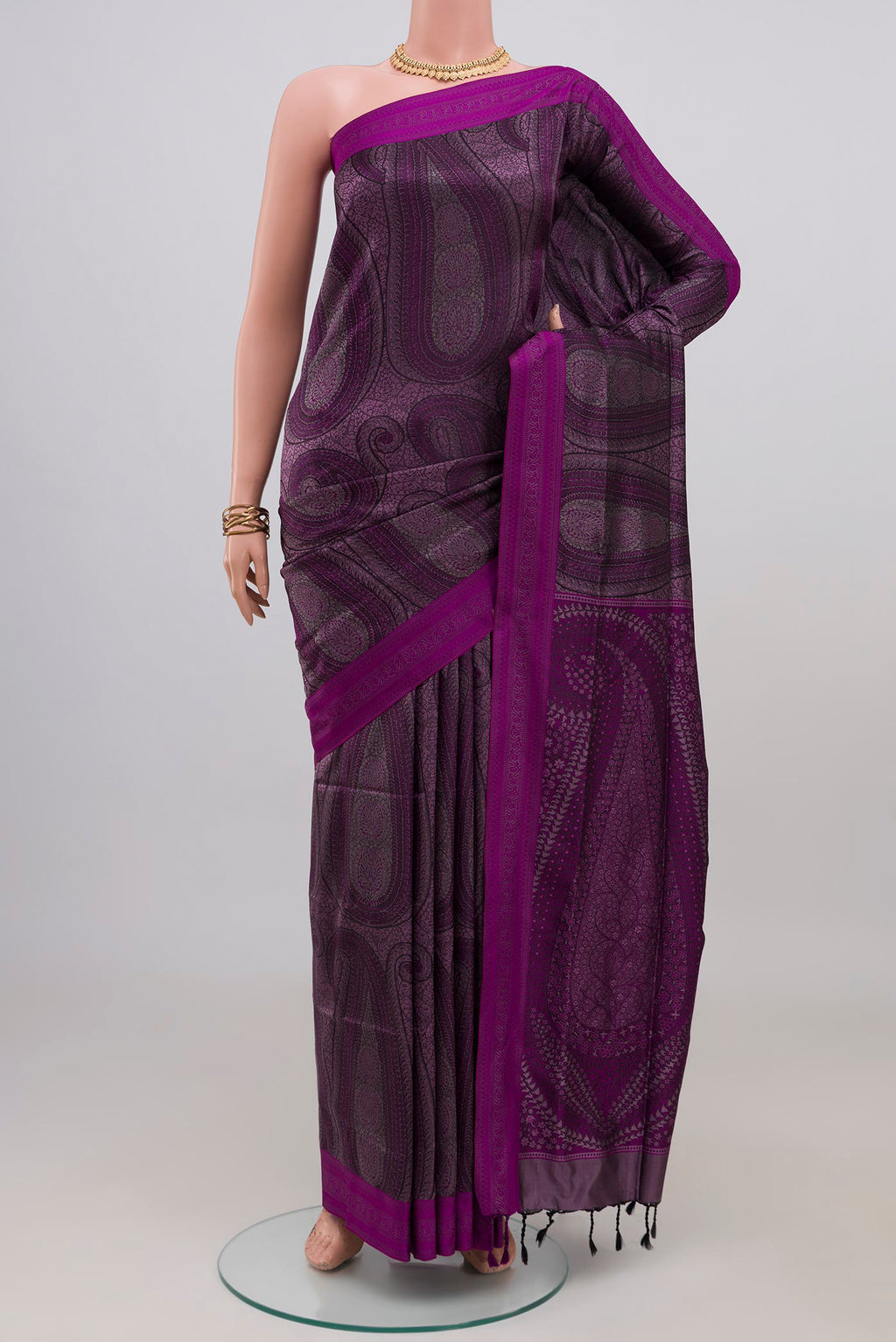 Purple Soft Silk Saree with Jacquard design on the body and Thread Border.  displayed on a mannequin
