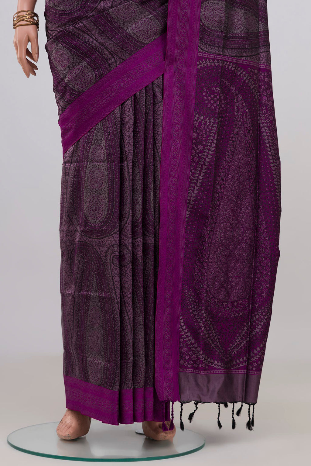 Pleats and pallu of Purple Soft Silk Saree with Jacquard design on the body and Thread Border. 