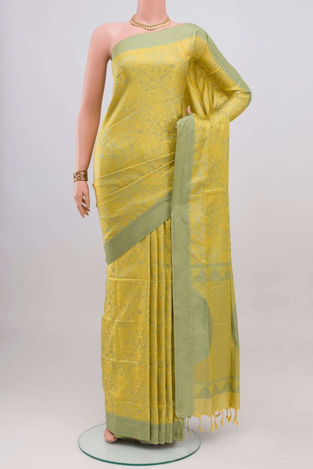 Lemon Yellow Soft Silk Saree with Jacquard design on the body and Thread Border.  displayed on a mannequin