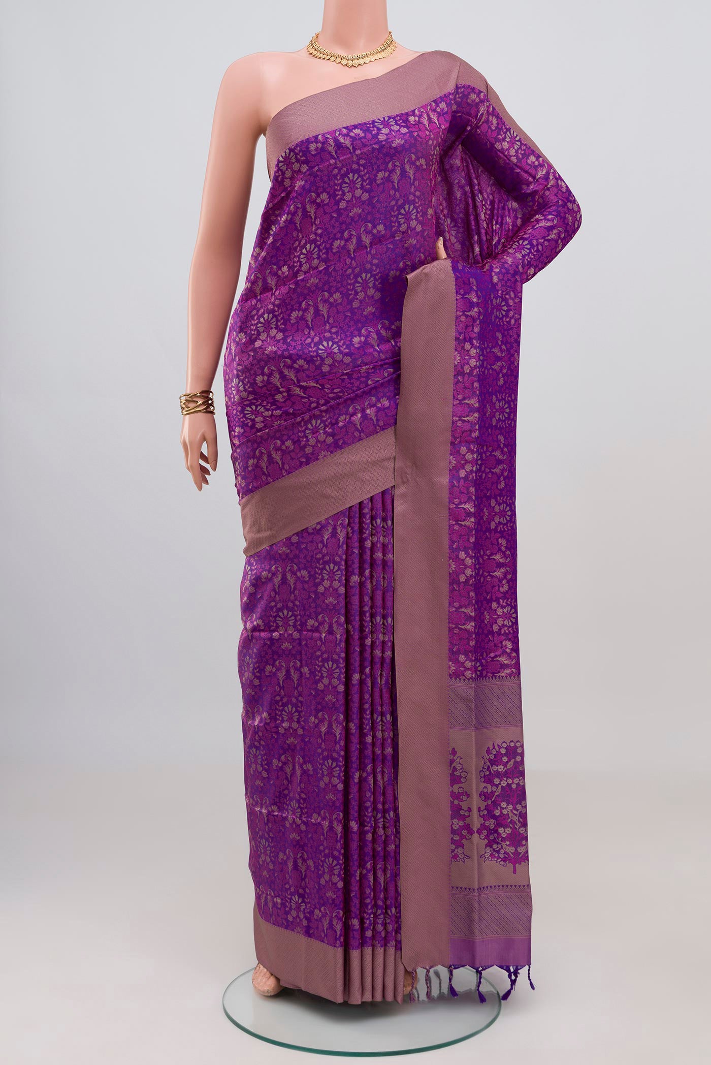 Purple Soft Silk Saree with Jacquard design on the body and Thread Border.  displayed on a mannequin