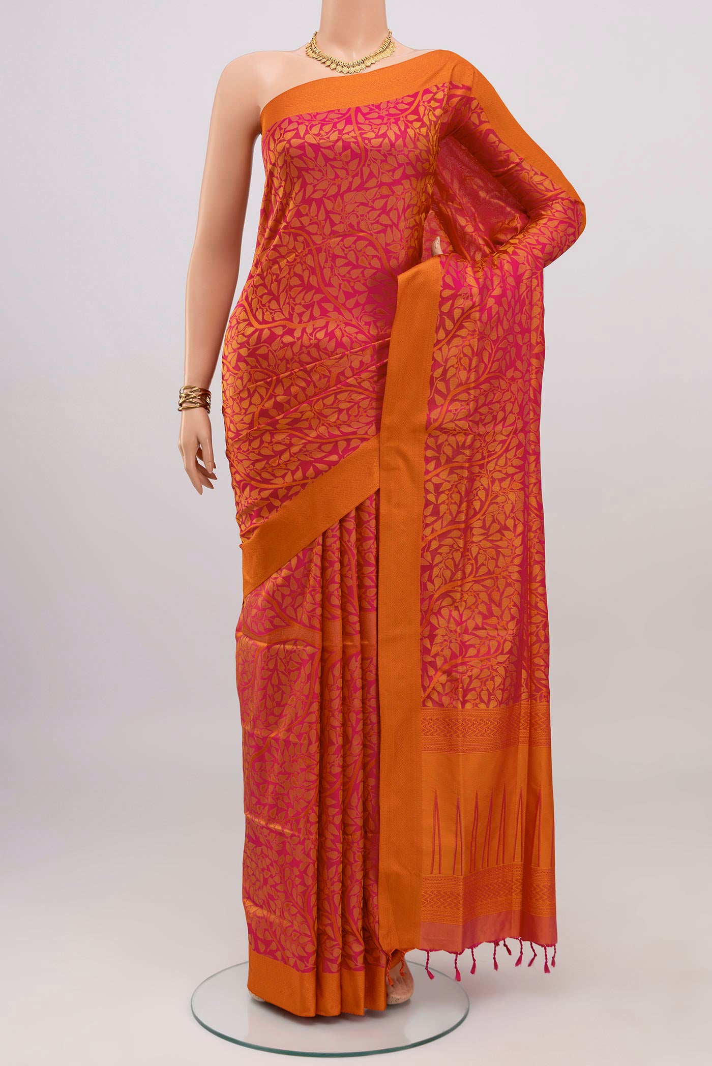 Pink Soft Silk Saree with Jacquard design on the body and Thread Border.  displayed on a mannequin