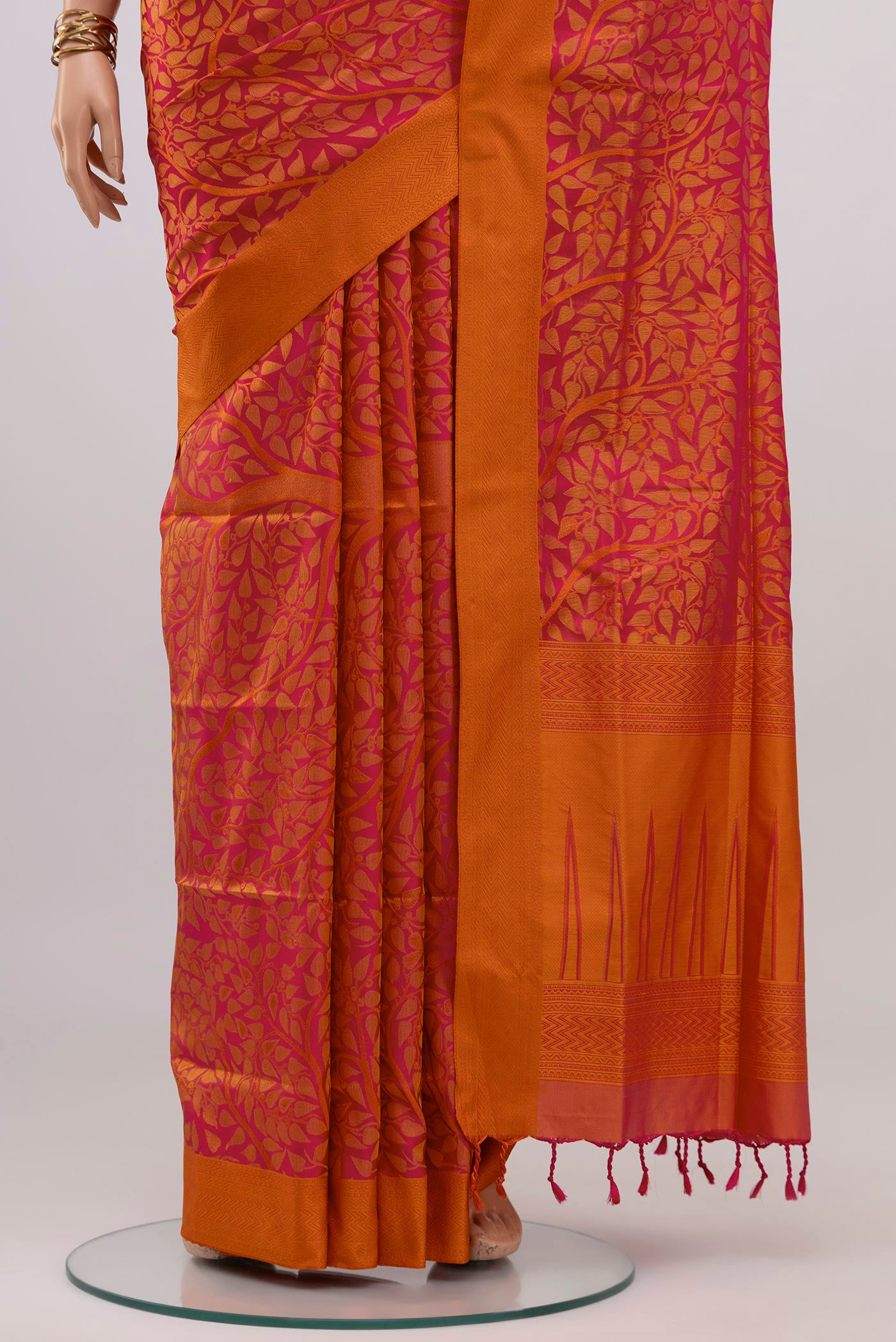 Pleats and pallu of Pink Soft Silk Saree with Jacquard design on the body and Thread Border. 
