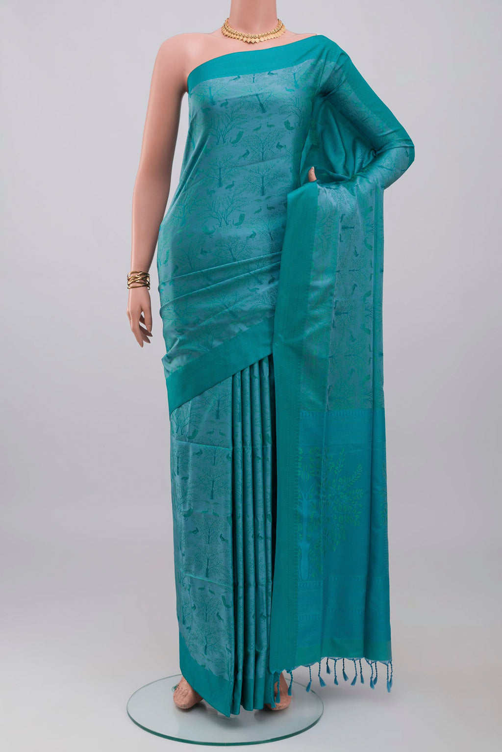 Blue Soft Silk Saree with Jacquard design on the body and Thread Border.  displayed on a mannequin