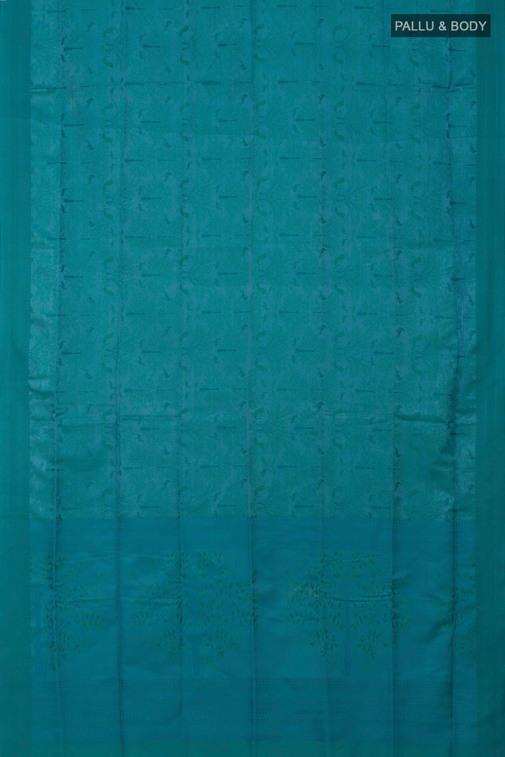 Flat view of Blue Soft Silk Saree with Jacquard design on the body and Thread Border. 