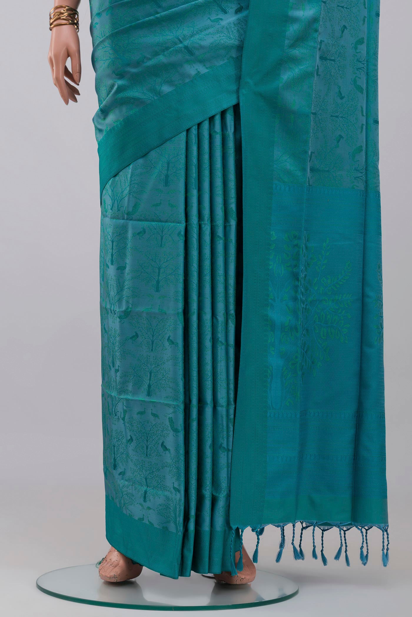 Pleats and pallu of Blue Soft Silk Saree with Jacquard design on the body and Thread Border. 