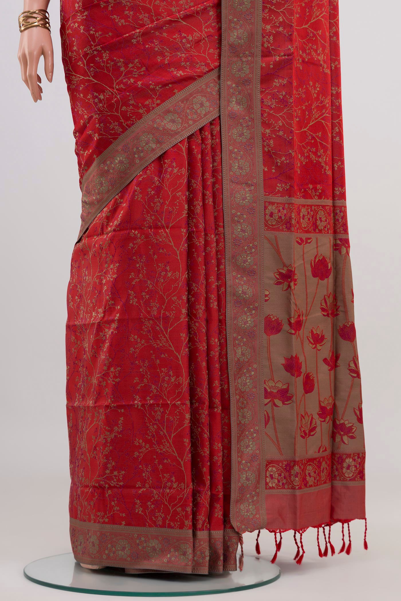 Pleats and pallu of Red Soft Silk Saree with Jacquard design on the body and Thread Border. 