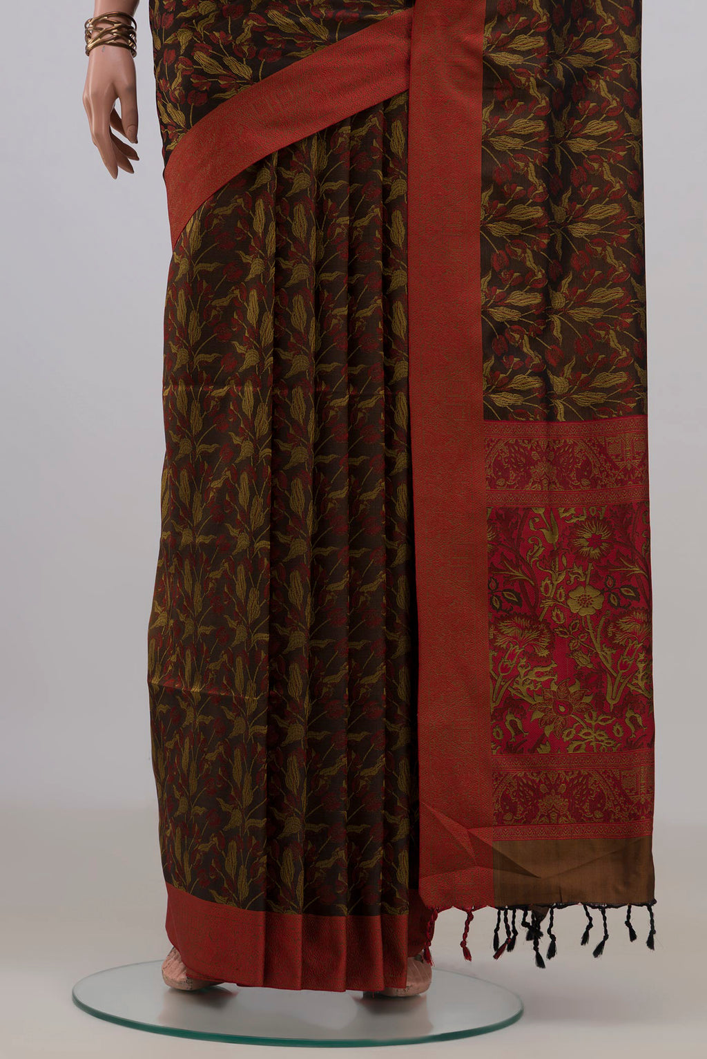 Pleats and pallu of Pure Silk Brown Soft Saree with Jacquard design on the body and Thread Border. 