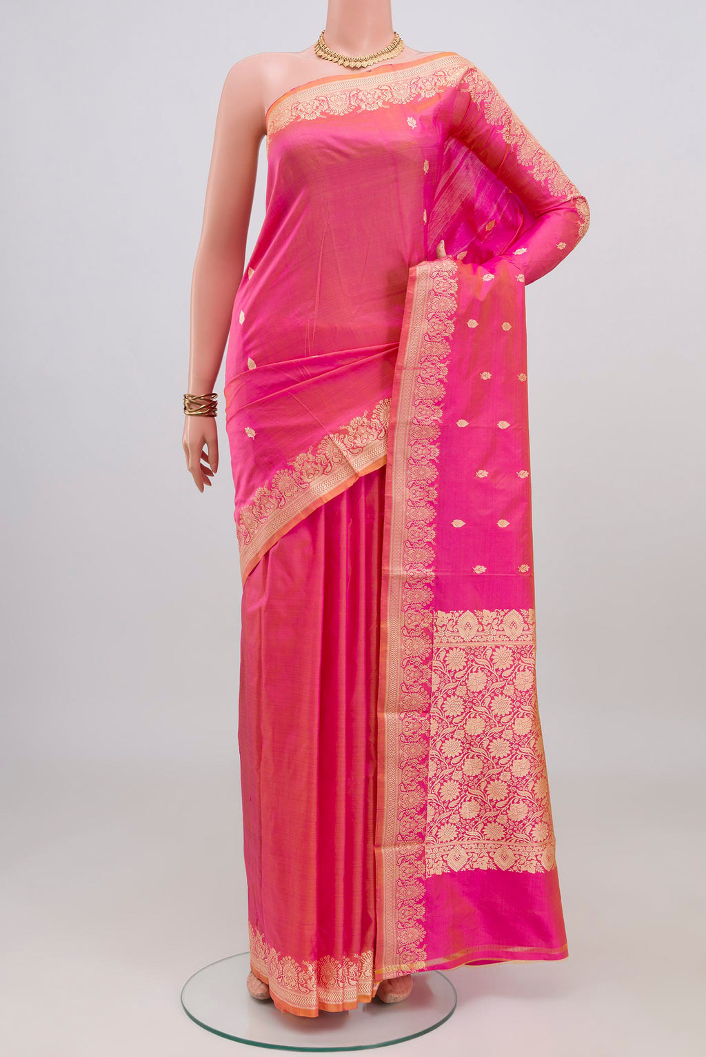Pink Banarasi Katan Silk Saree with Thread Butta on the body and Thread Border.  displayed on a mannequin