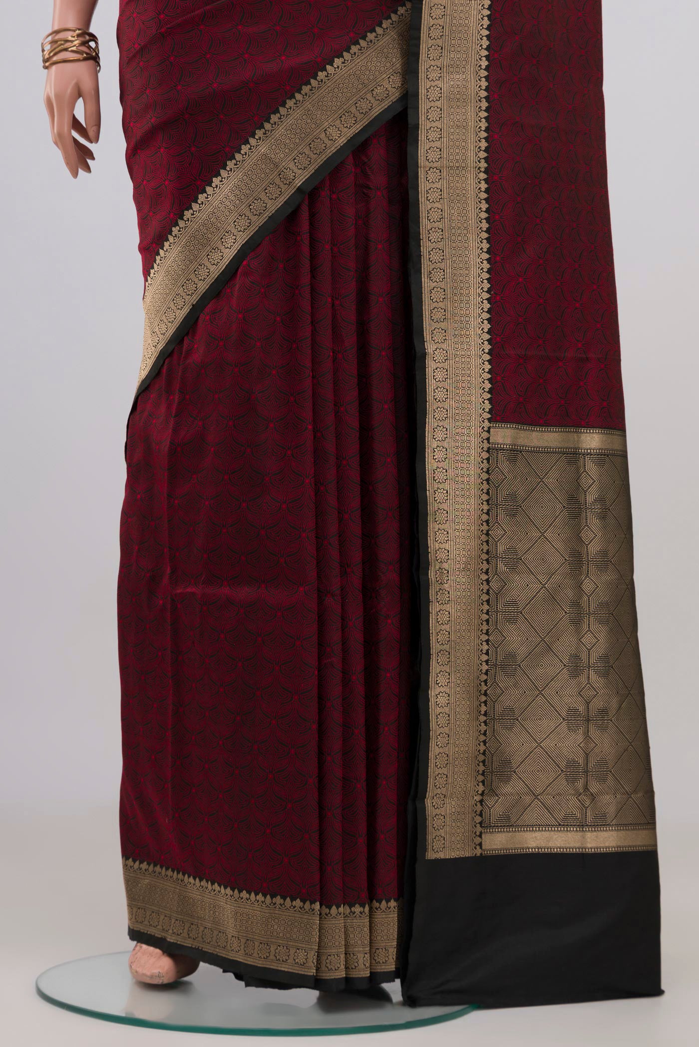 Pleats and pallu of Black Banarasi Katan Silk Saree with Jacquard design on the body and Zari Border. 