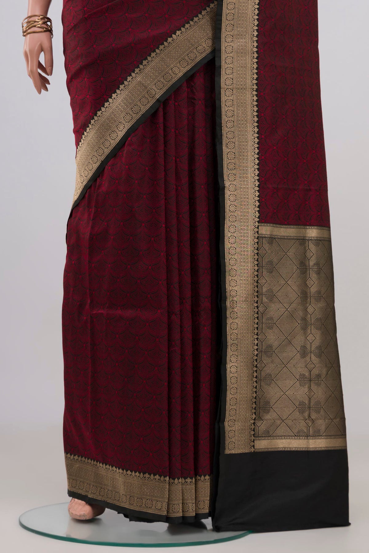 Pleats and pallu of Black Banarasi Katan Silk Saree with Jacquard design on the body and Zari Border. 