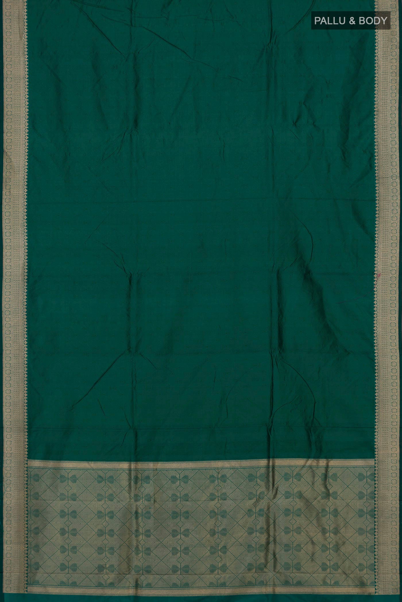 Flat view of Green Banarasi Katan Silk Saree with Plain Body and Zari Border. 