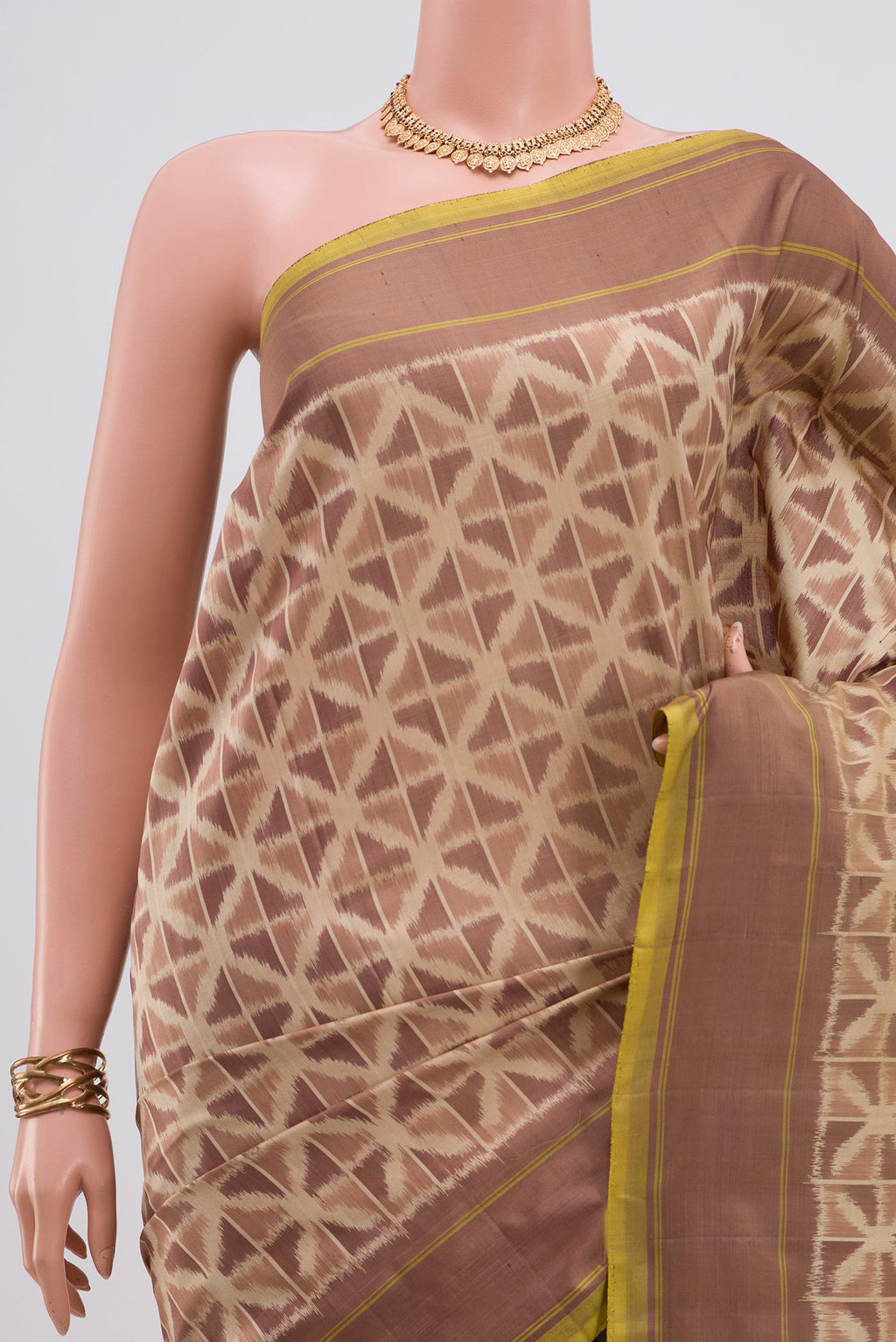 Border image of Beige Pochampally Saree with Ikat design on the body and Plain Border. 