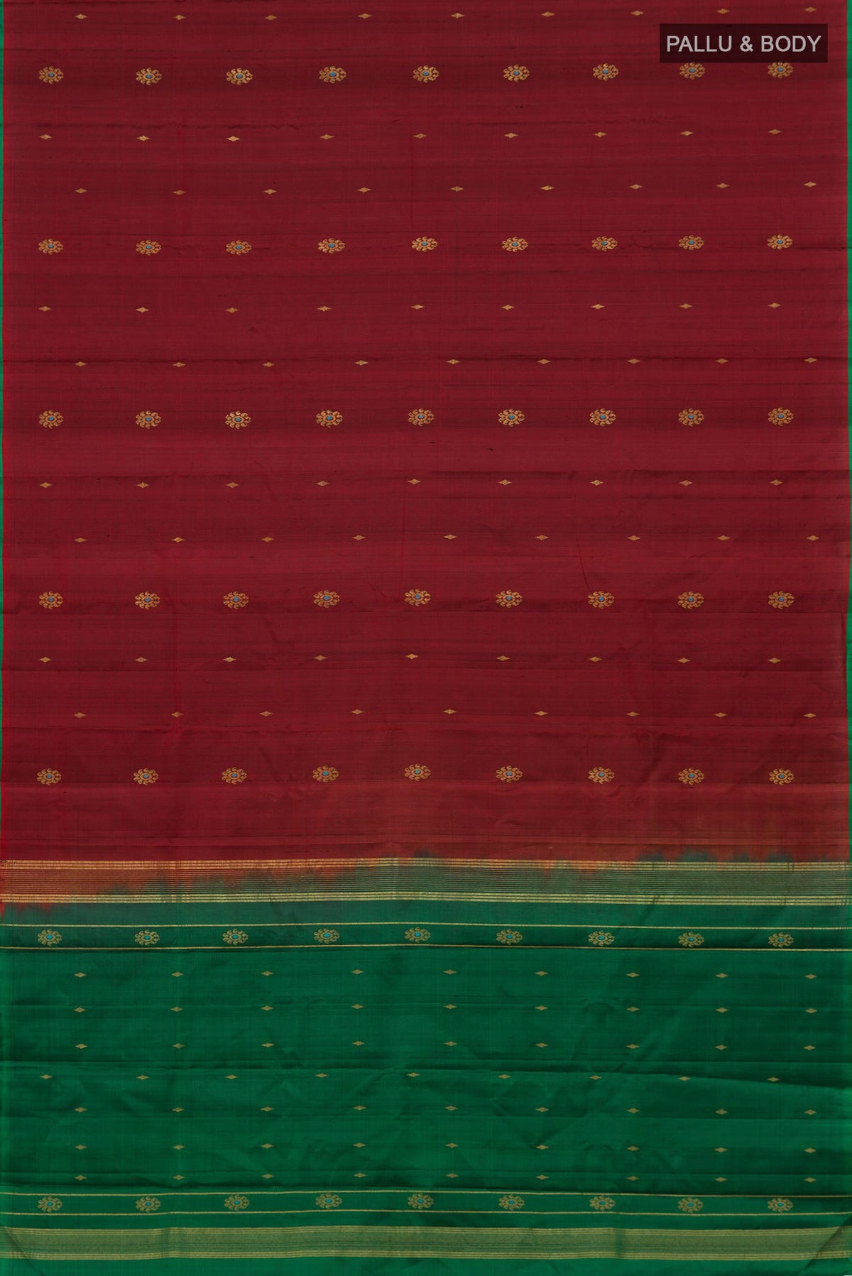 Flat view of Maroon Kanchipuram Silk Saree with Zari Butta on the body and Without Border. 