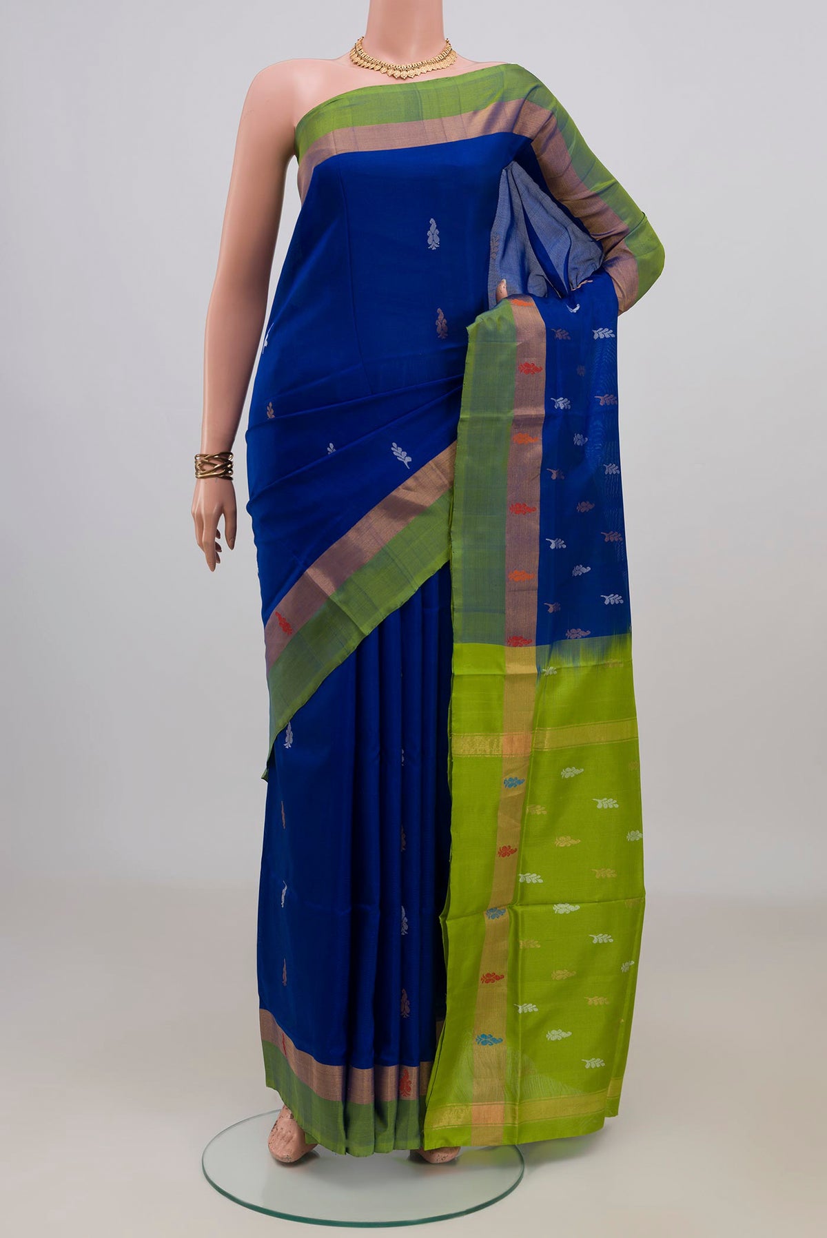 Pure Silk Royal Blue Uppada Saree with Thread Butta on the body and Fancy Border.  displayed on a mannequin