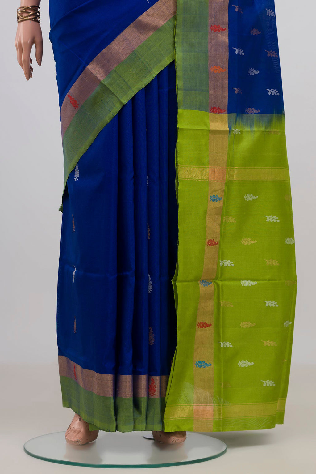 Pleats and pallu of Pure Silk Royal Blue Uppada Saree with Thread Butta on the body and Fancy Border. 